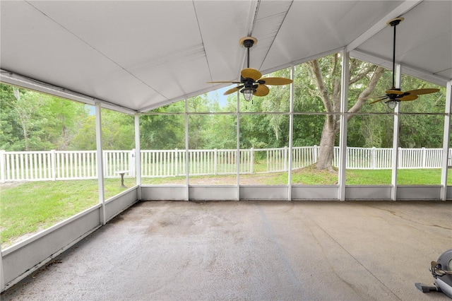 16804 Hawkridge Rd, Lithia, FL 33547 - unfurnished sunroom with a ceiling fan, vaulted ceiling, and healthy amount of natural light