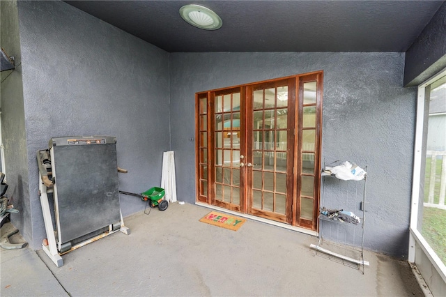 16804 Hawkridge Rd, Lithia, FL 33547 - misc room featuring french doors, lofted ceiling, and a textured wall