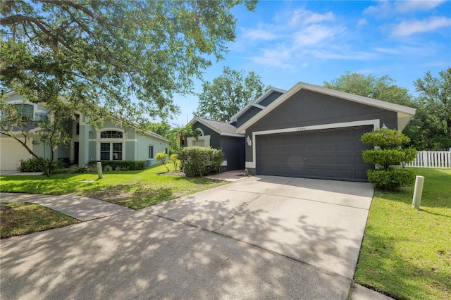 16804 Hawkridge Rd, Lithia, FL 33547 - single story home with concrete driveway, an attached garage, and stucco siding