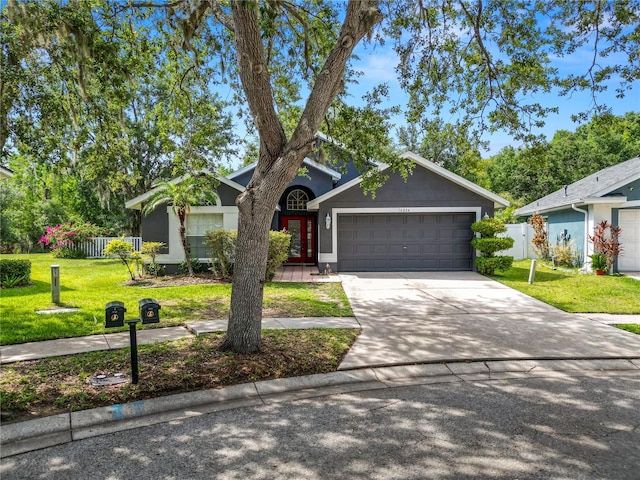 16804 Hawkridge Rd, Lithia, FL 33547 - view of front of house featuring an attached garage and concrete driveway