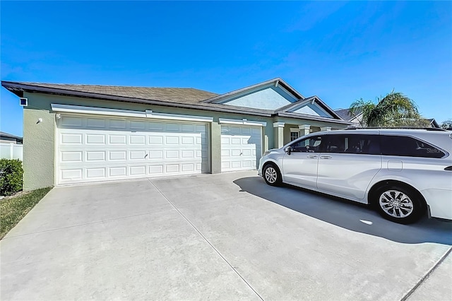 2929 Flying Blackbird Rd, Bartow, FL 33830 - ranch-style house featuring concrete driveway, stucco siding, and an attached garage