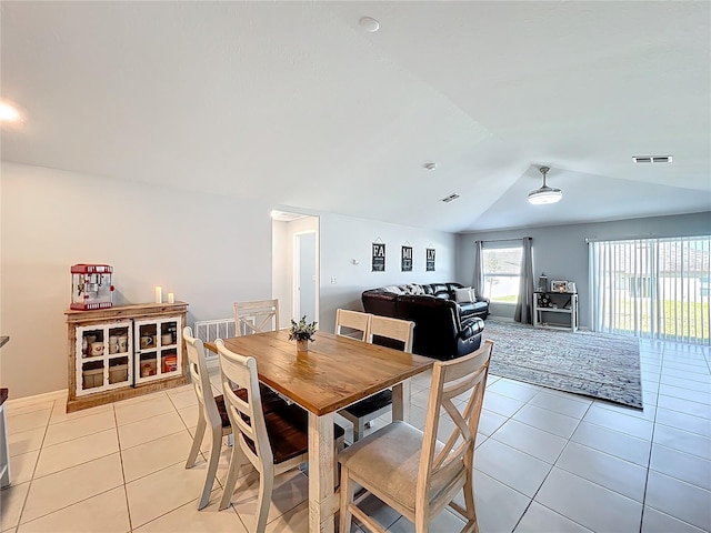 2929 Flying Blackbird Rd, Bartow, FL 33830 - dining space with light tile patterned floors and lofted ceiling