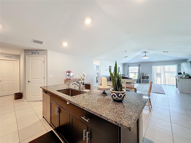 2929 Flying Blackbird Rd, Bartow, FL 33830 - kitchen featuring a sink, open floor plan, light tile patterned floors, dishwasher, and lofted ceiling