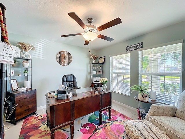 2929 Flying Blackbird Rd, Bartow, FL 33830 - home office featuring ceiling fan, light tile patterned floors, baseboards, and a textured ceiling