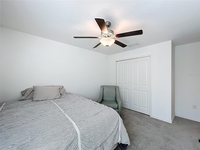 2929 Flying Blackbird Rd, Bartow, FL 33830 - bedroom with a closet, light carpet, ceiling fan, and baseboards