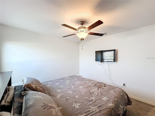 2929 Flying Blackbird Rd, Bartow, FL 33830 - bedroom with carpet flooring, a ceiling fan, and baseboards