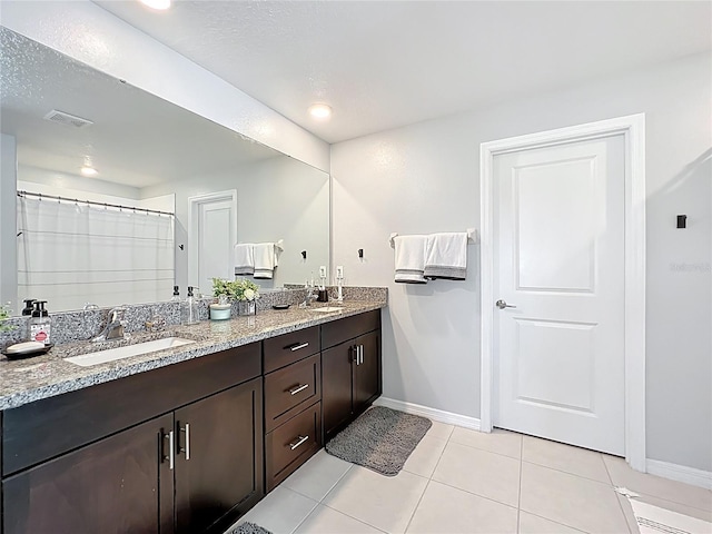 2929 Flying Blackbird Rd, Bartow, FL 33830 - full bath featuring double vanity, baseboards, tile patterned floors, curtained shower, and recessed lighting