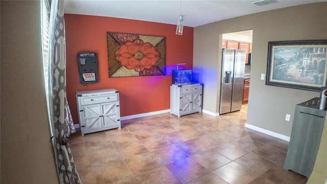 2170 Forest Lake Ave, Dundee, FL 33838 - tiled dining space with baseboards