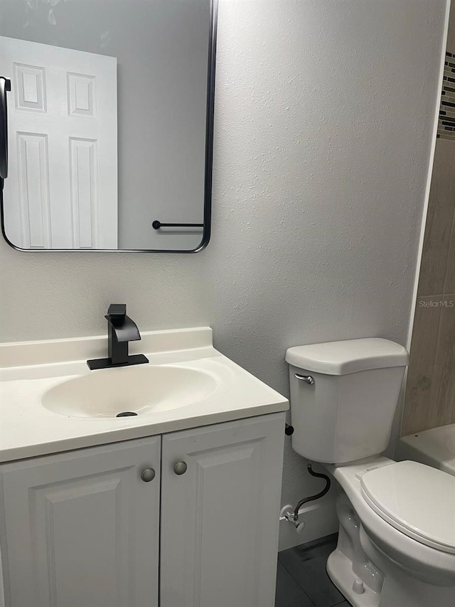 854 Shirley Ann Trl Unit 854/856, Lakeland, FL 33809 - bathroom featuring vanity, toilet, a shower, and a tub