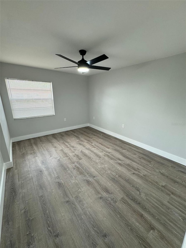854 Shirley Ann Trl Unit 854/856, Lakeland, FL 33809 - empty room with wood finished floors, baseboards, and ceiling fan
