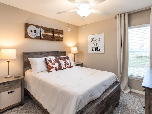 7019 161st Ter E, Parrish, FL 34219 - bedroom featuring carpet flooring, baseboards, and a ceiling fan