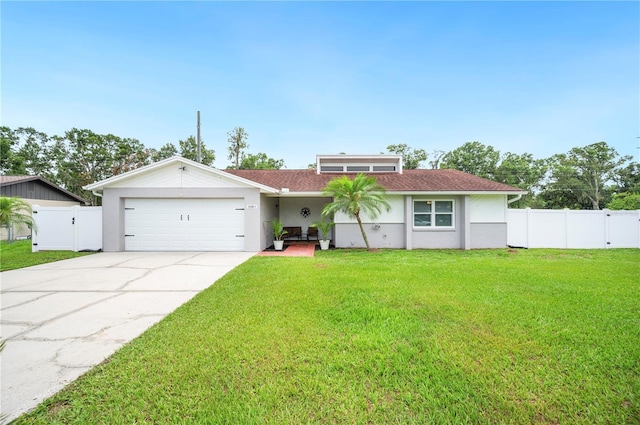 3080 Cross Fox Dr, Mulberry, FL 33860 - view of front of home with a garage, concrete driveway, and stucco siding