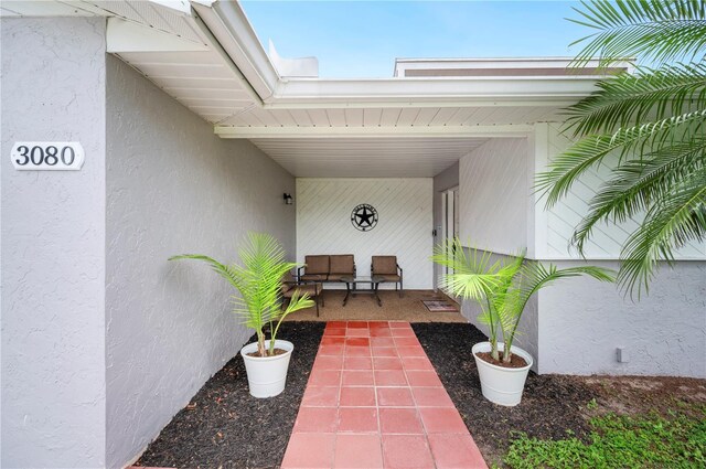 3080 Cross Fox Dr, Mulberry, FL 33860 - property entrance featuring stucco siding