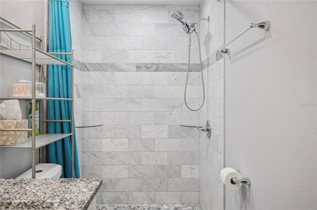 3080 Cross Fox Dr, Mulberry, FL 33860 - full bathroom featuring a tile shower and toilet