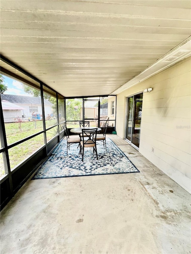 355 Pico Ct, Lakeland, FL 33809 - sunroom / solarium featuring outdoor dining space