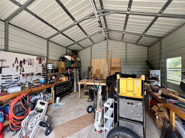 355 Pico Ct, Lakeland, FL 33809 - garage with a workshop area and metal wall