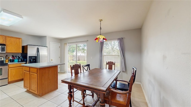 7337 Hunters Greene Cir, Lakeland, FL 33810 - dining room with light tile patterned floors