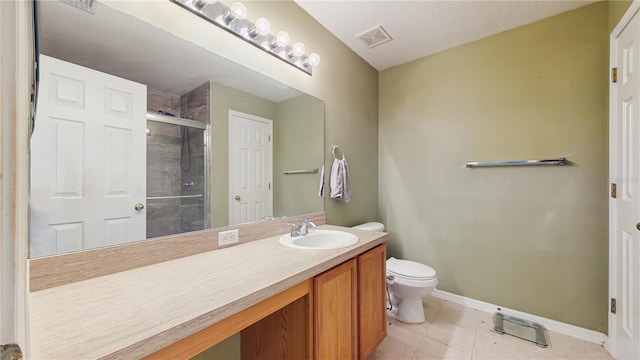 7337 Hunters Greene Cir, Lakeland, FL 33810 - full bathroom featuring baseboards, vanity, tile patterned flooring, a shower stall, and toilet