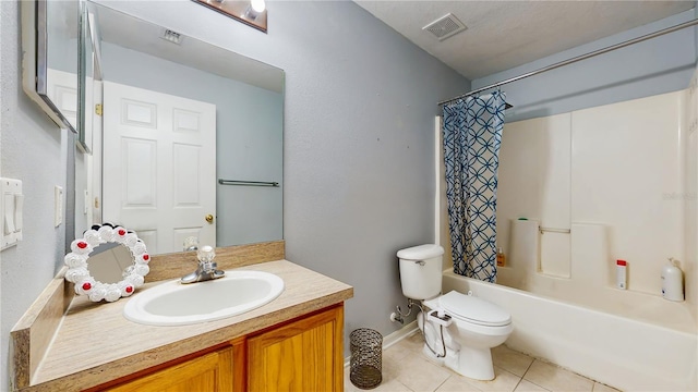 7337 Hunters Greene Cir, Lakeland, FL 33810 - full bath featuring tile patterned flooring, toilet, vanity, shower / bath combination with curtain, and baseboards