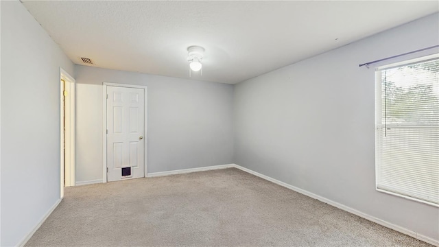 7337 Hunters Greene Cir, Lakeland, FL 33810 - carpeted spare room featuring baseboards
