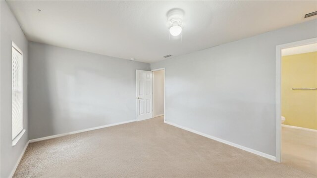 7337 Hunters Greene Cir, Lakeland, FL 33810 - carpeted empty room featuring baseboards