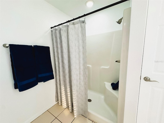 709 N Polk Ave, Fort Meade, FL 33841 - bathroom with tile patterned flooring and a shower with shower curtain