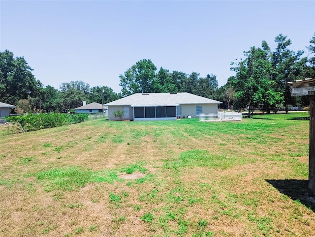 709 N Polk Ave, Fort Meade, FL 33841 - view of yard featuring a sunroom