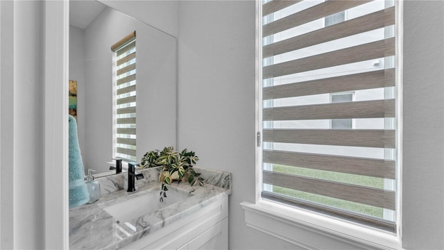 1172 Windjammer Dr, Lakeland, FL 33803 - bathroom featuring plenty of natural light and vanity