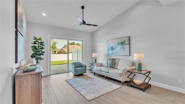 1172 Windjammer Dr, Lakeland, FL 33803 - living room with a ceiling fan, light wood-style flooring, high vaulted ceiling, and recessed lighting