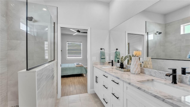 1172 Windjammer Dr, Lakeland, FL 33803 - bathroom featuring ensuite bath, walk in shower, and double vanity