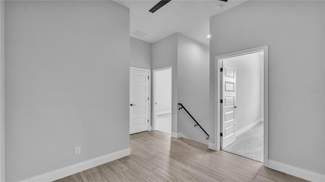 1172 Windjammer Dr, Lakeland, FL 33803 - unfurnished room featuring light wood-style flooring, a ceiling fan, a smoke detector, and recessed lighting