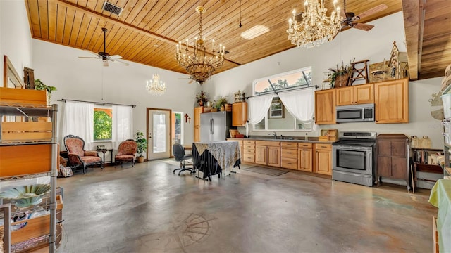 841 E Valencia St, Lakeland, FL 33805 - kitchen with stainless steel appliances, a chandelier, a high ceiling, concrete flooring, and wood ceiling