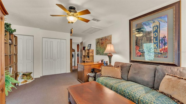 841 E Valencia St, Lakeland, FL 33805 - living area with attic access, a ceiling fan, and carpet flooring