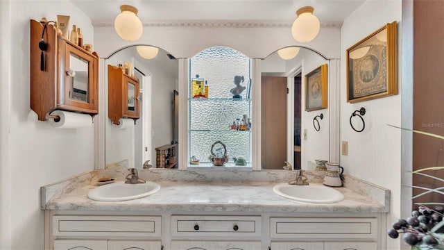 841 E Valencia St, Lakeland, FL 33805 - full bathroom featuring double vanity and plenty of natural light