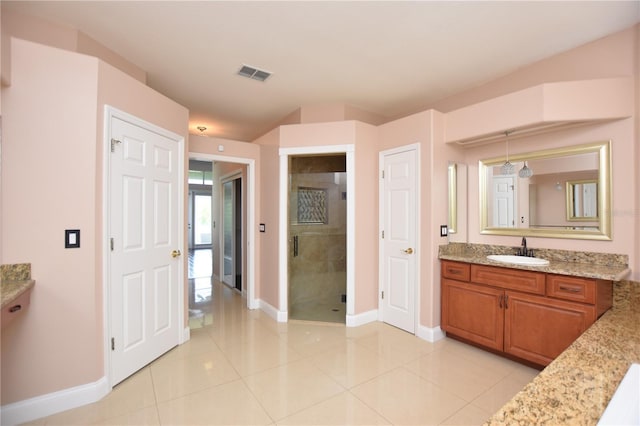 943 Hamilton Place Ln, Lakeland, FL 33813 - bathroom with vanity, a stall shower, and tile patterned floors
