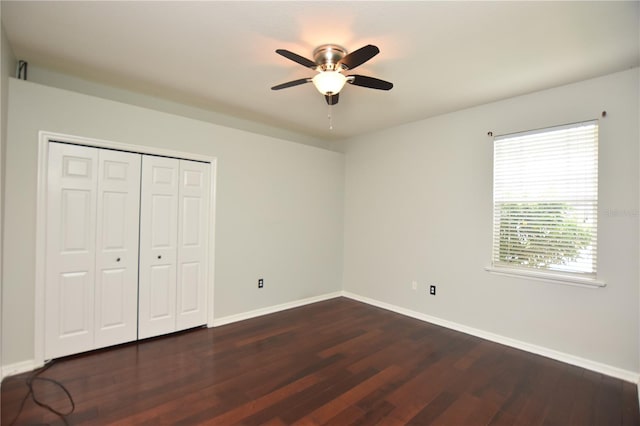 943 Hamilton Place Ln, Lakeland, FL 33813 - unfurnished bedroom featuring dark wood-style flooring, a closet, and ceiling fan