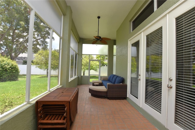 943 Hamilton Place Ln, Lakeland, FL 33813 - sunroom / solarium featuring french doors, a ceiling fan, and a water view