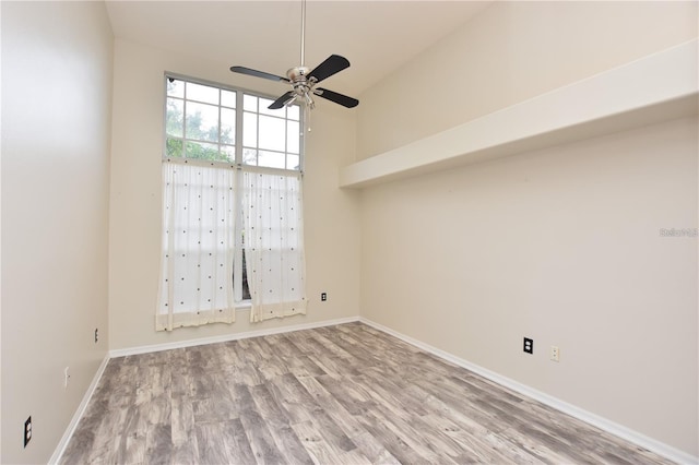 943 Hamilton Place Ln, Lakeland, FL 33813 - empty room featuring a ceiling fan and wood finished floors