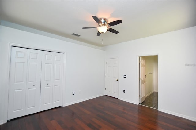 943 Hamilton Place Ln, Lakeland, FL 33813 - unfurnished bedroom with wood finished floors, a ceiling fan, and a closet