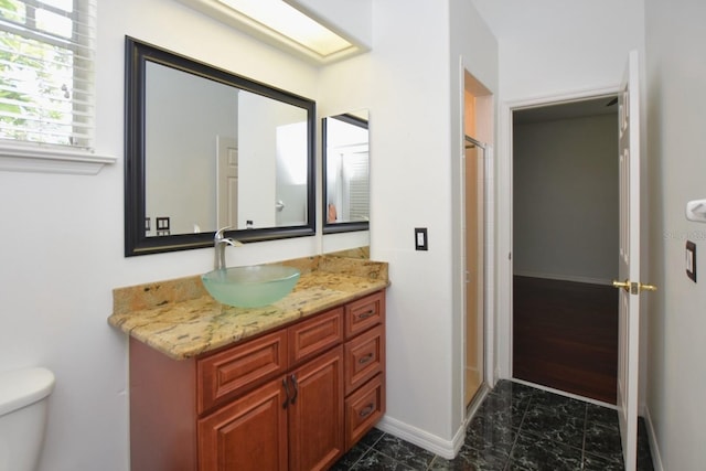 943 Hamilton Place Ln, Lakeland, FL 33813 - full bath featuring vanity, marble finish flooring, and a shower