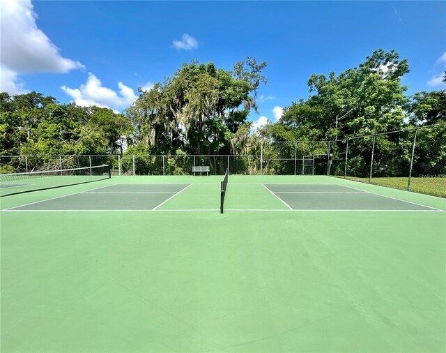 943 Hamilton Place Ln, Lakeland, FL 33813 - view of tennis court with community basketball court