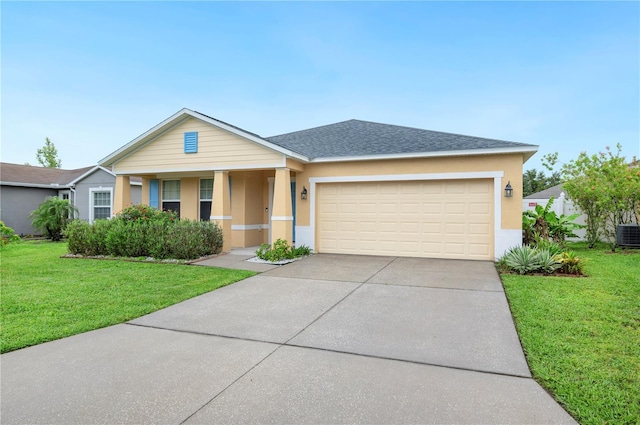 6819 Glenbrook Dr, Lakeland, FL 33811 - ranch-style home featuring stucco siding, an attached garage, concrete driveway, and a front yard