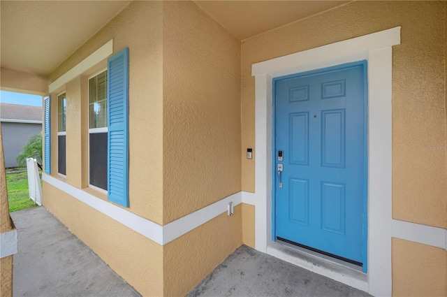 6819 Glenbrook Dr, Lakeland, FL 33811 - view of exterior entry featuring stucco siding