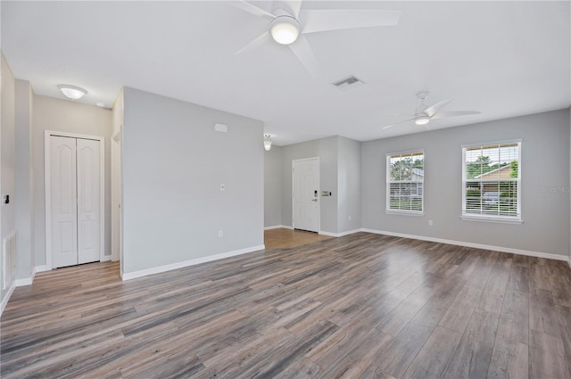 6819 Glenbrook Dr, Lakeland, FL 33811 - empty room featuring a ceiling fan, wood finished floors, and baseboards