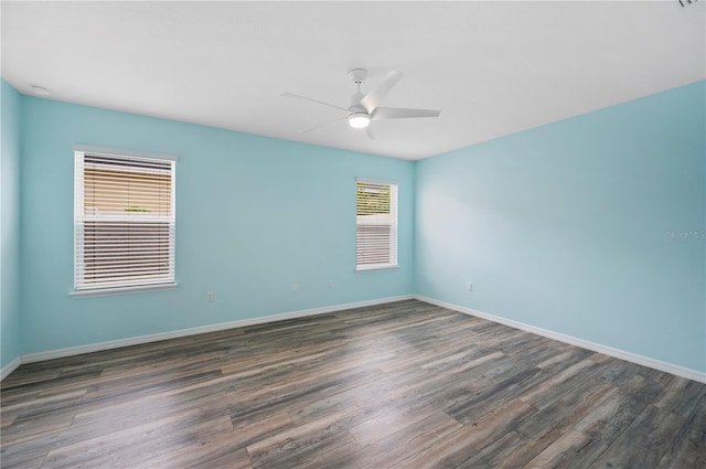 6819 Glenbrook Dr, Lakeland, FL 33811 - empty room with ceiling fan, dark wood-style floors, and baseboards