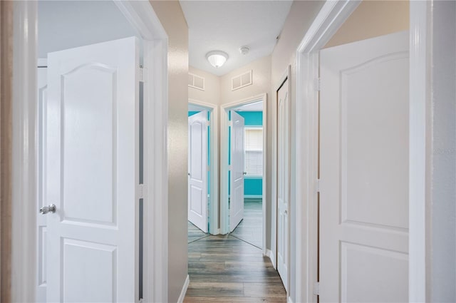 6819 Glenbrook Dr, Lakeland, FL 33811 - hall with dark wood-style flooring and baseboards