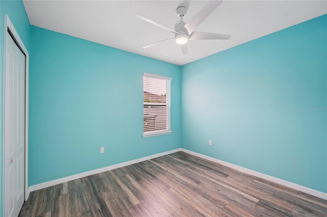 6819 Glenbrook Dr, Lakeland, FL 33811 - unfurnished bedroom with a closet, wood finished floors, baseboards, and a ceiling fan