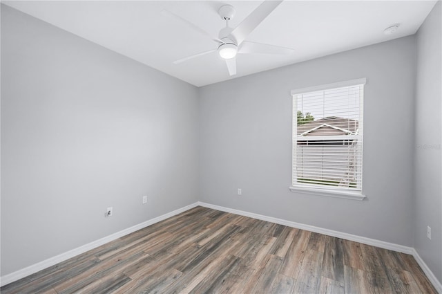 6819 Glenbrook Dr, Lakeland, FL 33811 - unfurnished room featuring wood finished floors, baseboards, a ceiling fan, and a smoke detector