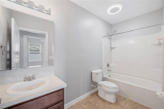 6819 Glenbrook Dr, Lakeland, FL 33811 - full bath with toilet, vanity, shower / washtub combination, tile patterned flooring, and baseboards
