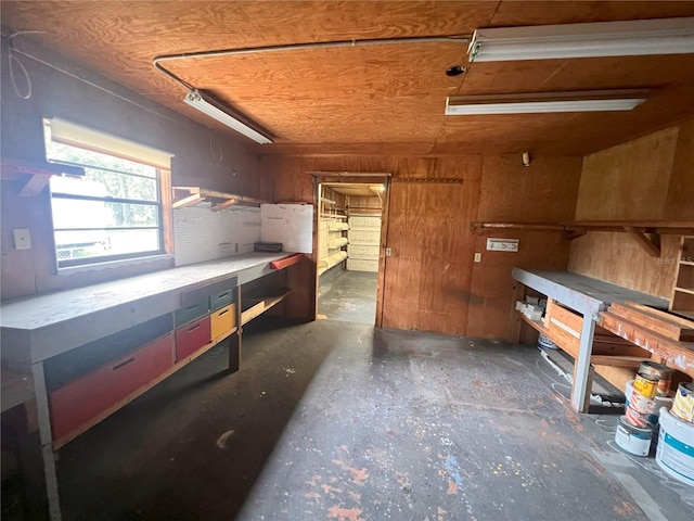 8504 N Campbell Rd, Lakeland, FL 33810 - miscellaneous room featuring a workshop area and concrete flooring